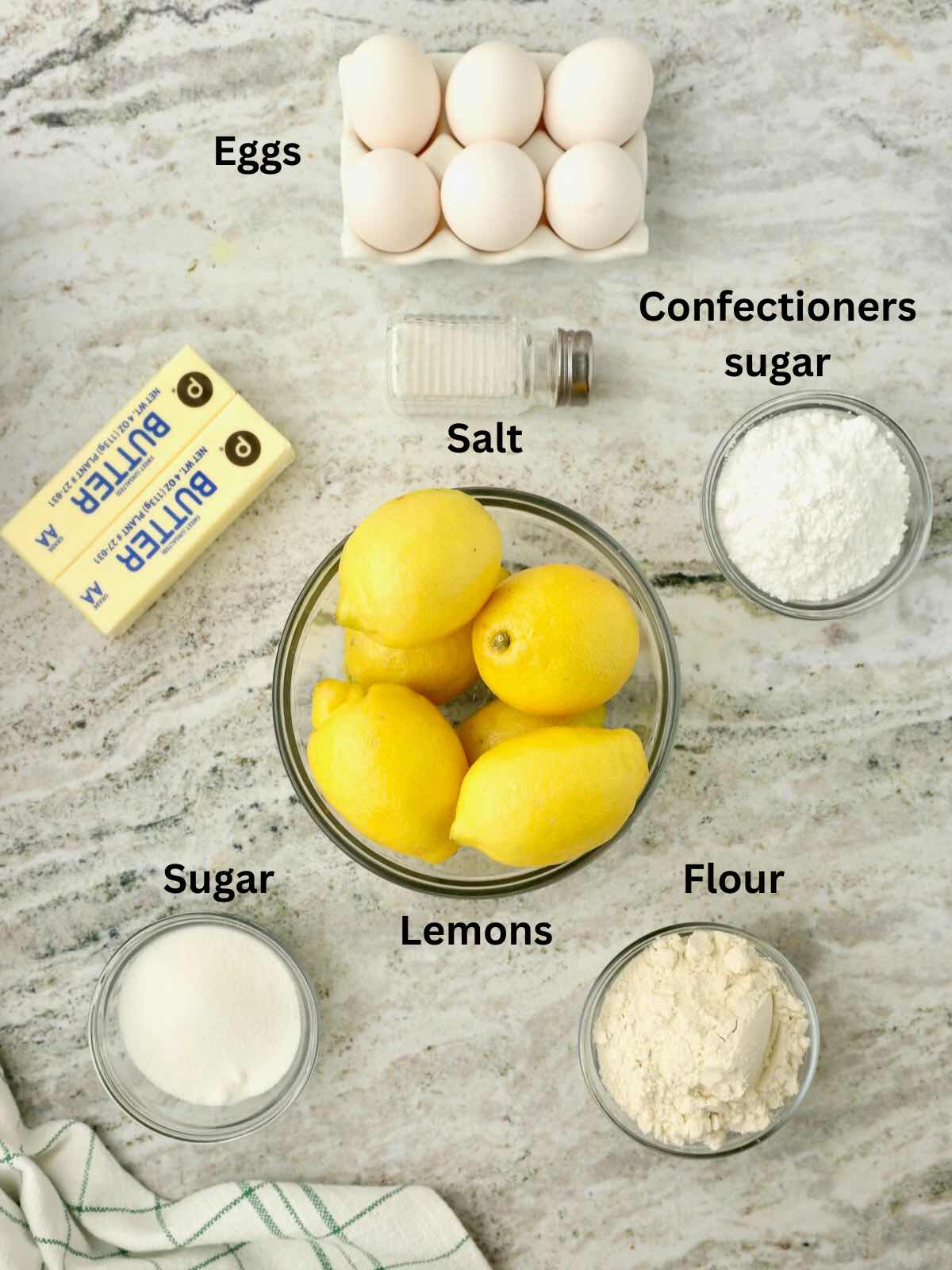 Ingredients for Meyer lemon bars include lemons, flour, granulated sugar, and confectioners sugar and salt. 