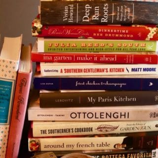 A stack of cookbooks for the post Ten Tips for Starting a Cookbook Club