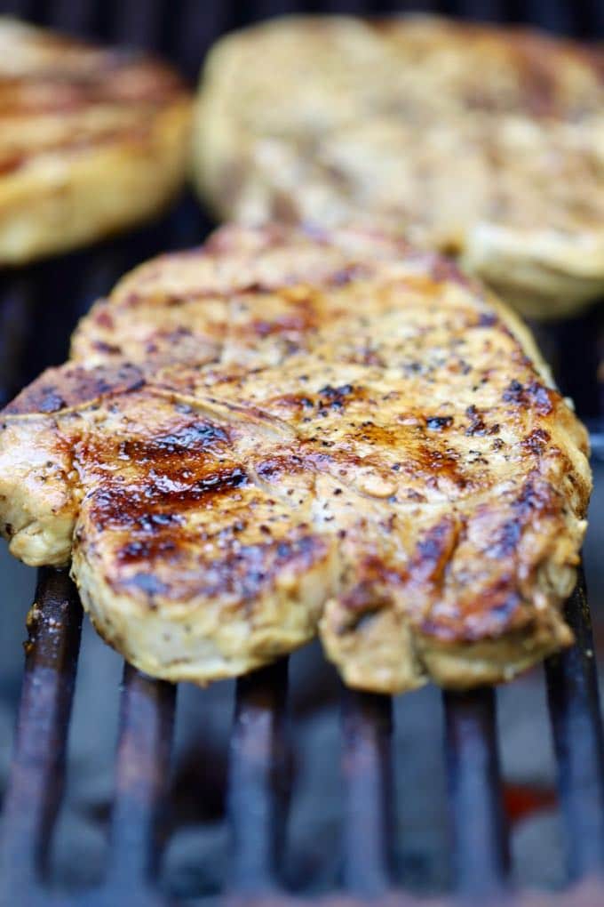 Pork Chops on a barbecue grill for Easy Grilled Pork Chops and Marinade 