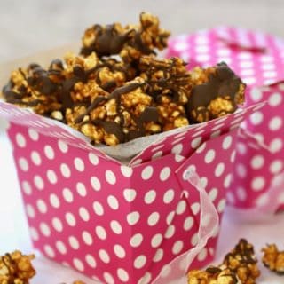 Caramel Corn with Chocolate Drizzle in a pink and white polka dot box