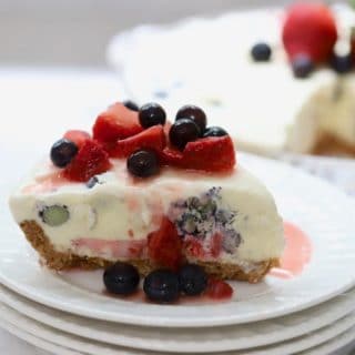 Red White and Blue Ice Cream Pie full of strawberries and blueberries