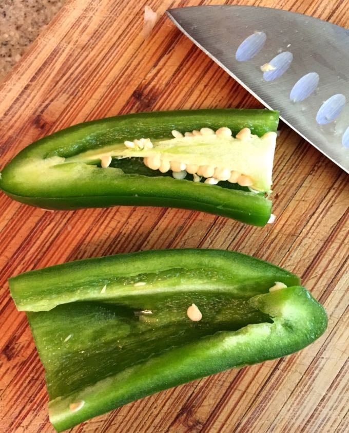 Seeding a jalapeno pepper for Easy Southern Fresh Peach Salsa