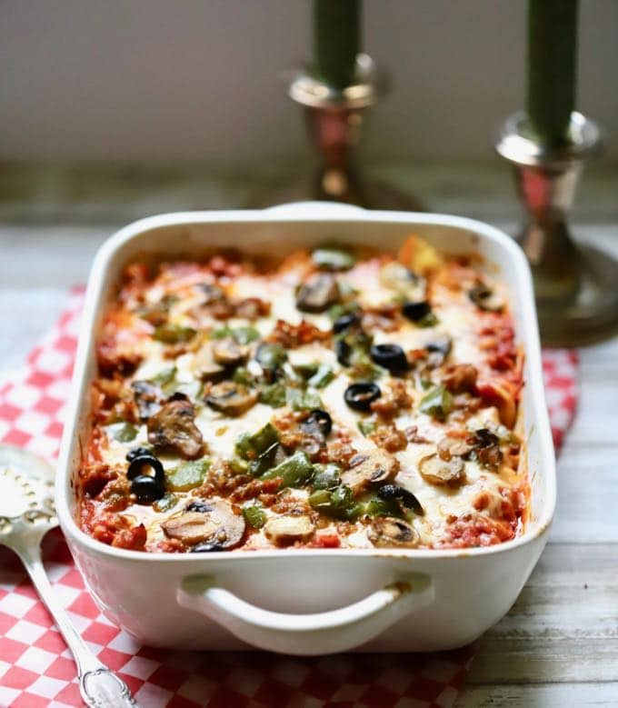 Easy Supreme Pizza Casserole in a white baking dish ready to serve