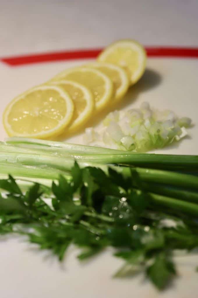 Prepped lemons, scallions and parsley for Pan Fried Fish with Blistered Tomatoes