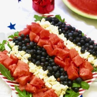 Red, White, and Blue Summer Fruit Salad with watermelon, feta cheese and blueberries ready for the 4th of July