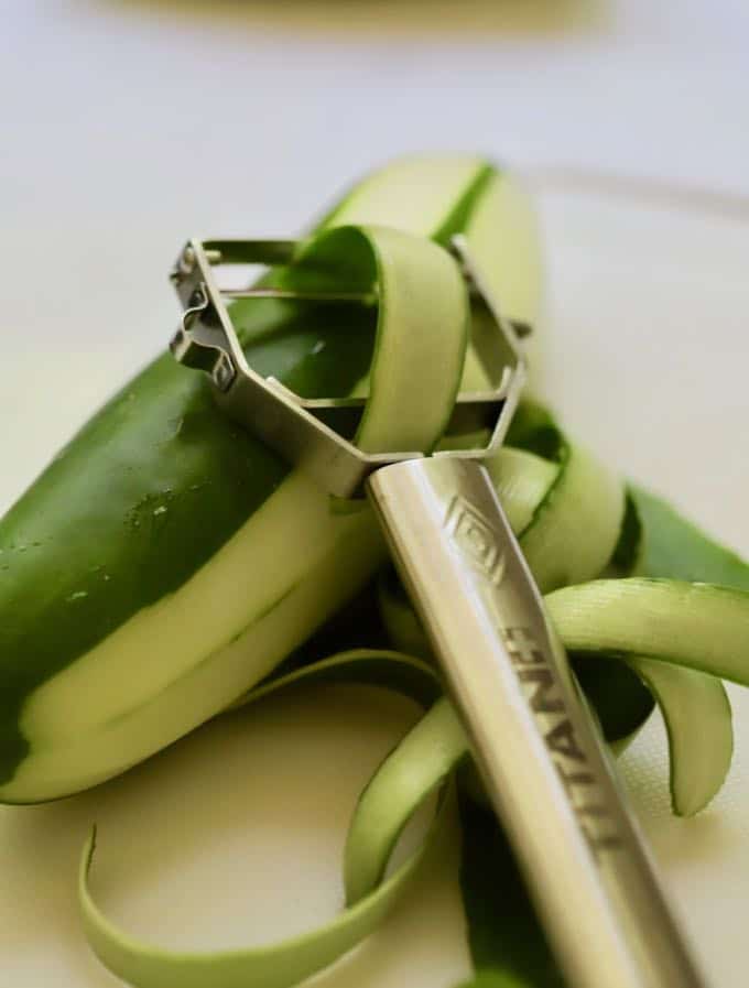 Peeling a cucumber for Chilled Watermelon Gazpacho Soup