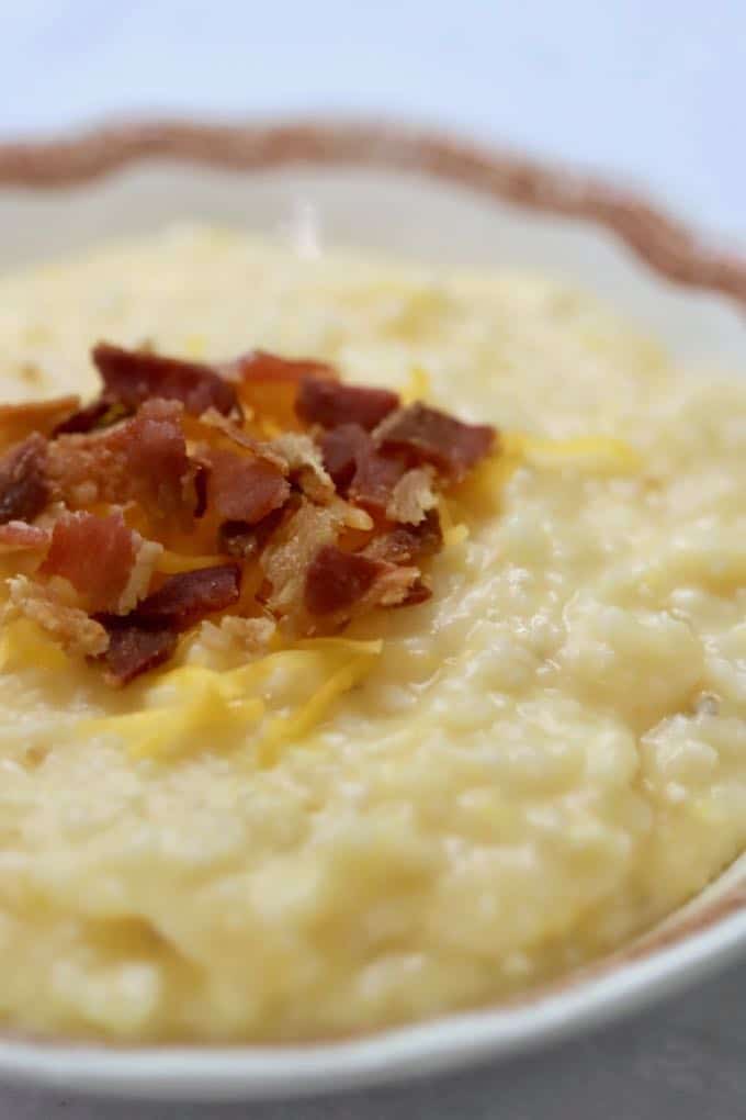 Close up of a bowl of Southern Crockpot Easy Cheesy Grits