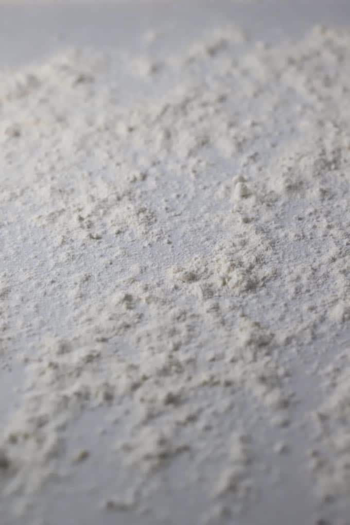 Flour on a cutting board for Orange Cinnamon Rolls