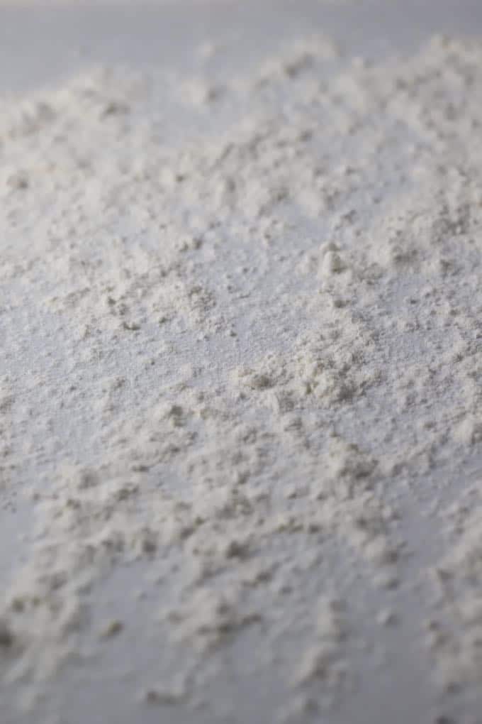 Flour on a cutting board for Orange Cinnamon Rolls