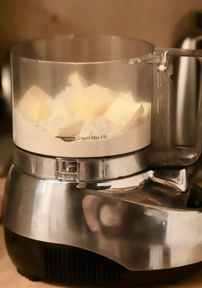 Cold butter and flour in a food processor for Orange Cinnamon Rolls