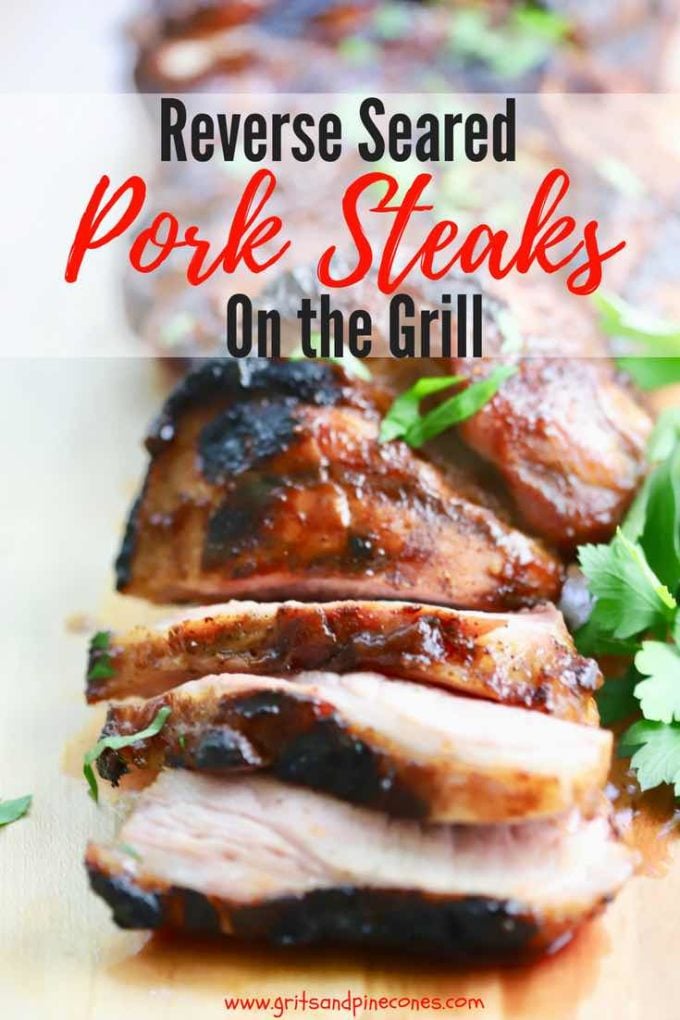 Looking for a super easy recipe for grilling pork steaks? If you are tired of grilling the same old thing, check out this delicious new way of Reverse Searing Pork Steaks on the Grill which cooks them low and slow at first, then fast sears them. Check out the step by step directions for how to cook pork steaks on the grill. #barbecue, #pork, #dinner, #easydinner, #dinnerrecipe,