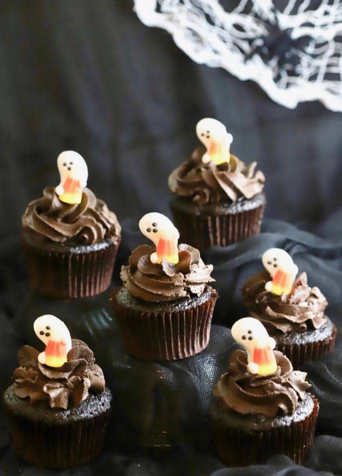 Candy Ghosts top these Easy Chocolate Halloween Cupcakes and Icing
