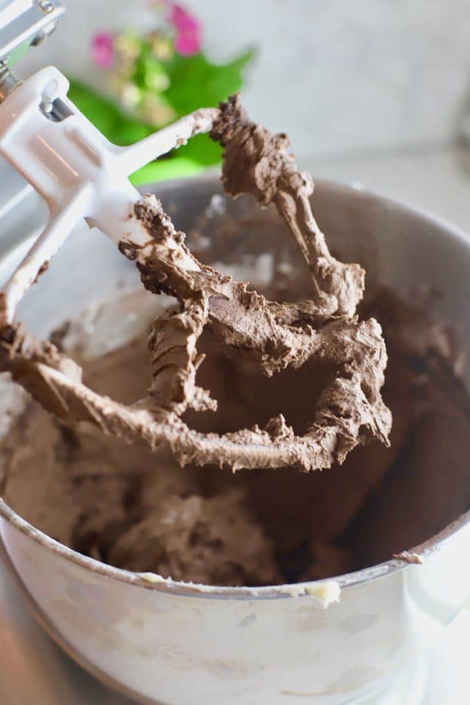 Chocolate Buttercream icing in a mixing bowl for Easy Chocolate Halloween Cupcakes and Icing