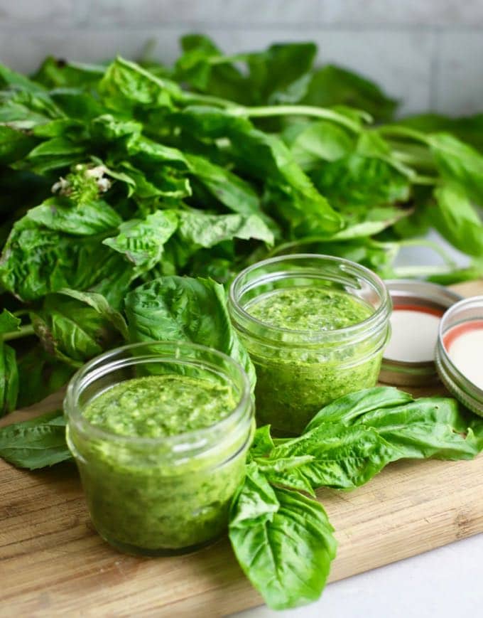 Easy Homemade Southern Basil Pesto in two glass jars