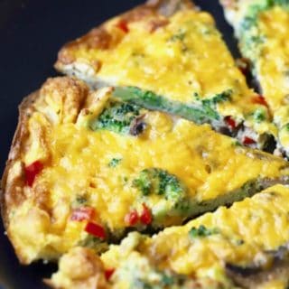 Easy Mushroom Broccoli Frittata cut into slices and ready to serve