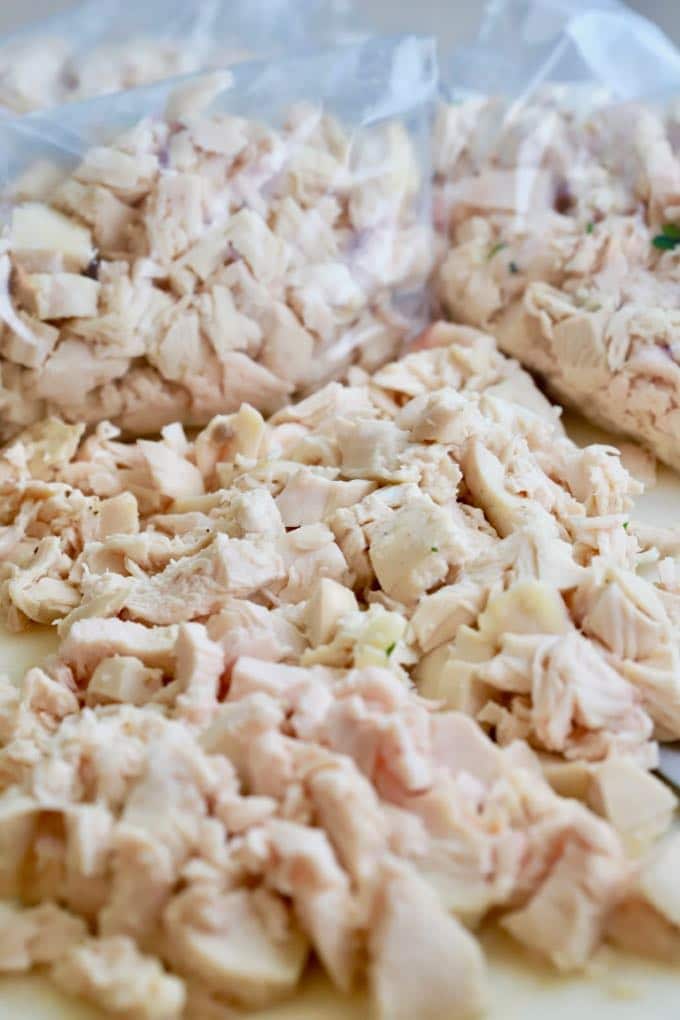 Easy Roasted Bone-In Chicken Breast cut up and packaged for the freezer 