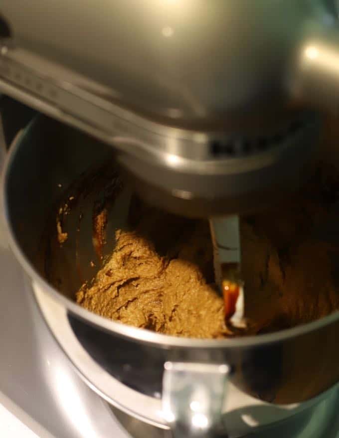 Mixing molasses in to the dough for Old Fashioned Crunchy Gingersnap Cookies