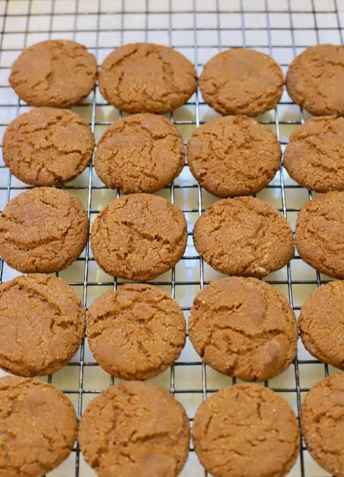 Old Fashioned Crunchy Gingersnap Cookies cooling on a wire rack.
