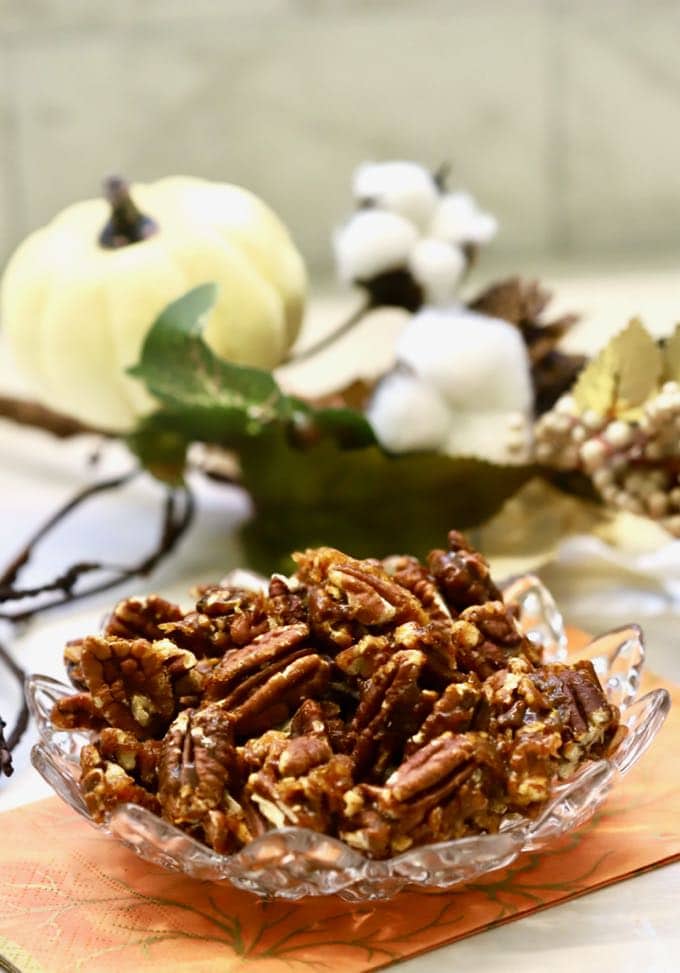 Quick and Easy Stovetop Candied Pecans in a glass dish