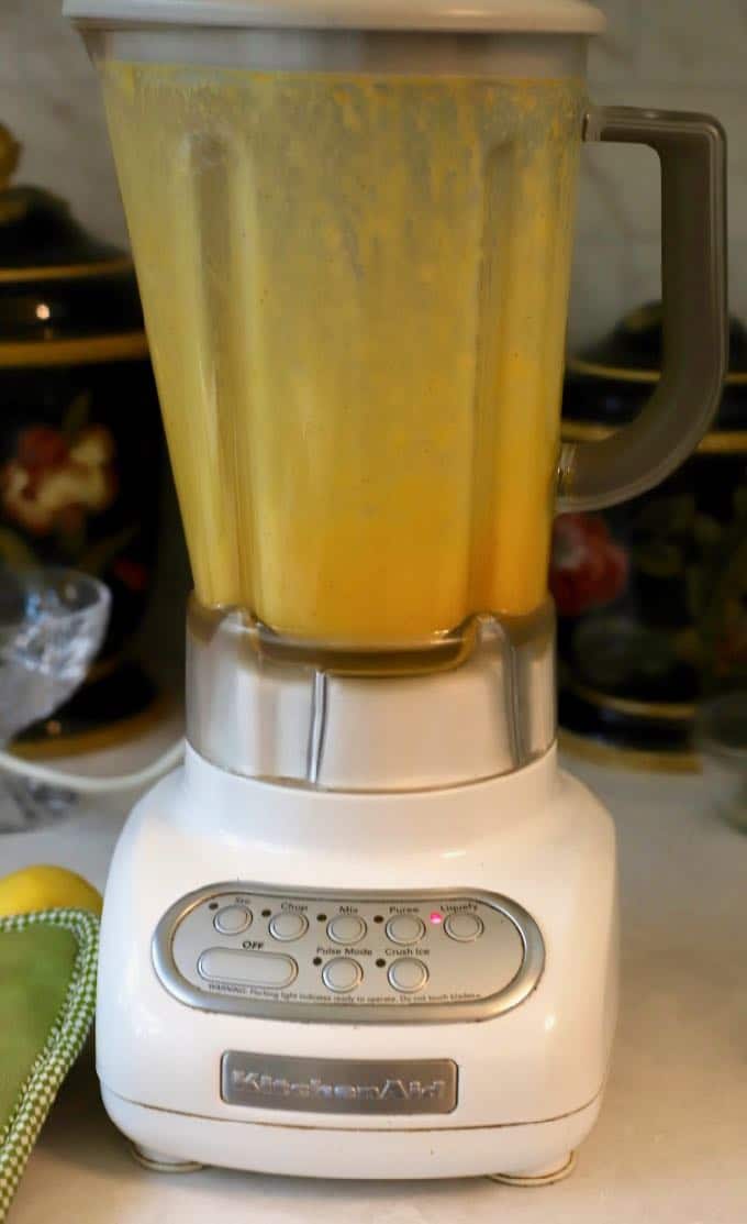 Making easy blender hollandaise sauce forEasy Eggs Benedict Casserole