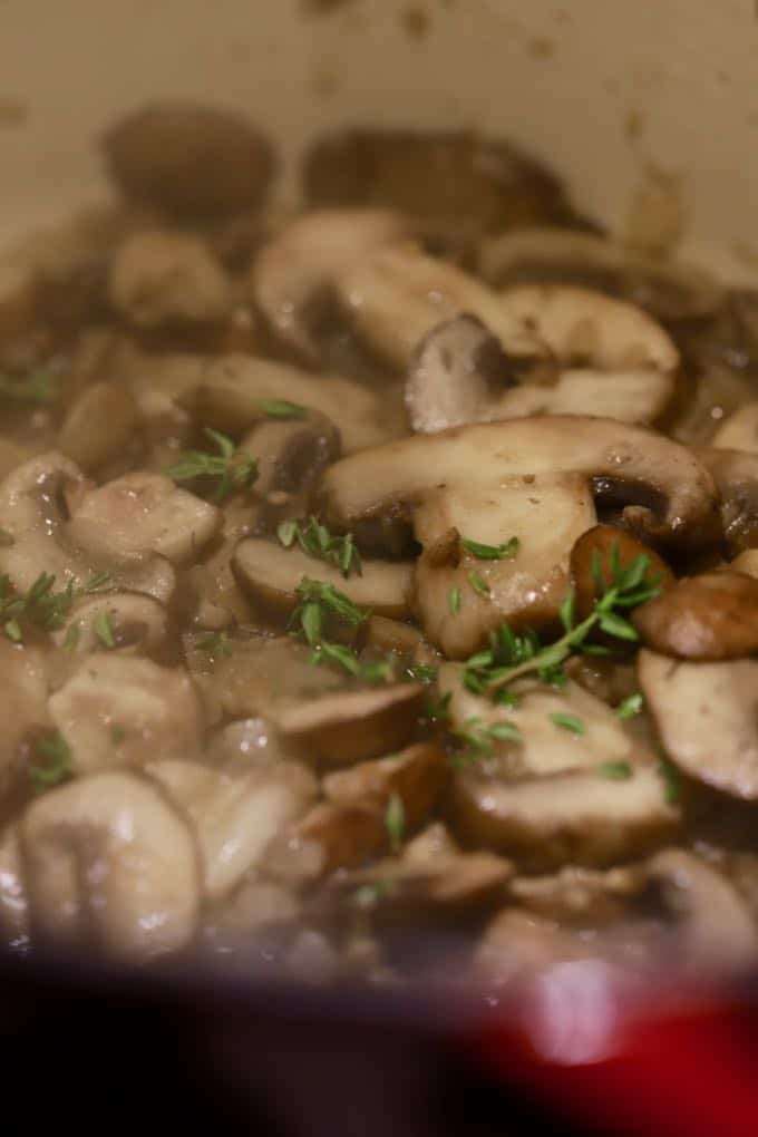 Cooking mushrooms in a Dutch oven for Green Bean Pie with Ritz Cracker Crust