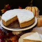 Cutting a slice out of a Pumpkin Cheesecake with Gingersnap Crust
