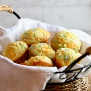 Broccoli Cheddar Cornbread Muffins in a basket.