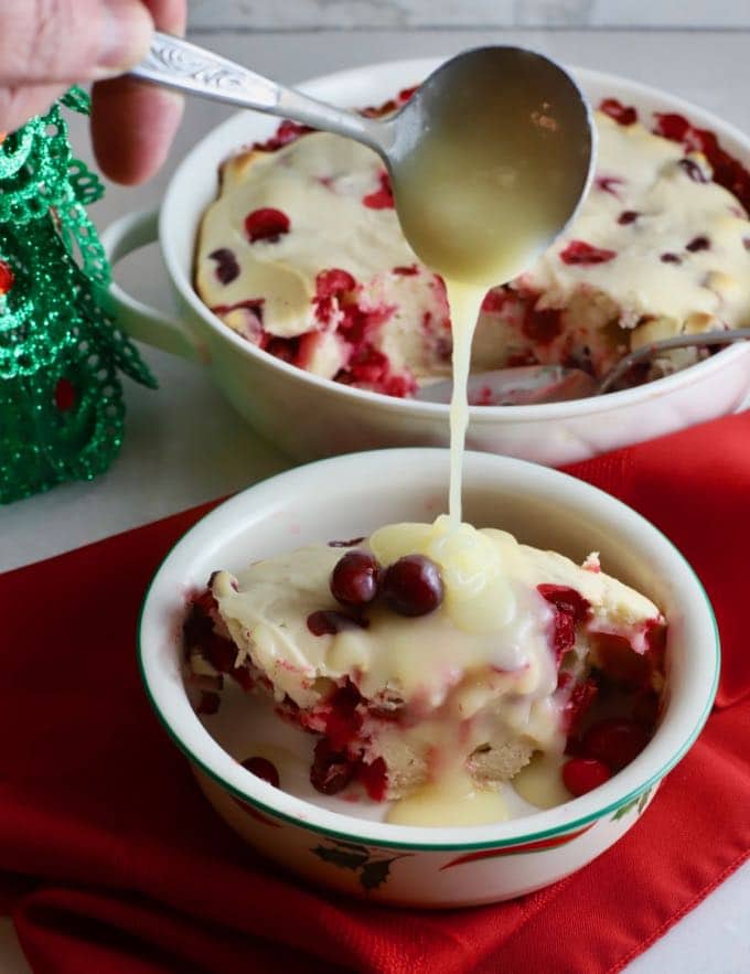 Cranberry Cake with Hard sauce in a Christmas bowl.