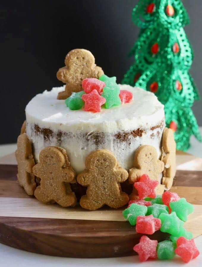 Gingerbread Cake with Cream Cheese Icing topped with red and green Christmas candy.