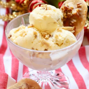 Pecan Pralines and Cream Ice Cream in a glass bowl on red and white napkins