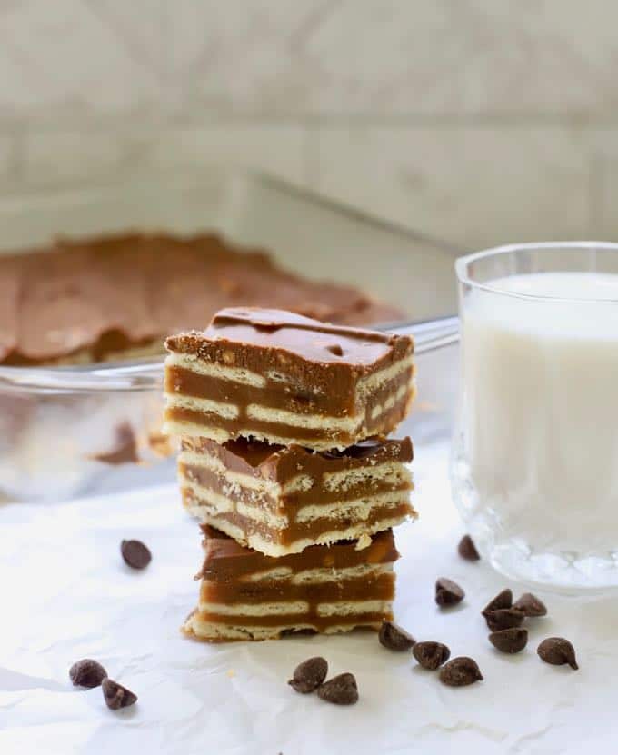 A stack of three homemade copycat kit kat bars and a glass of milk