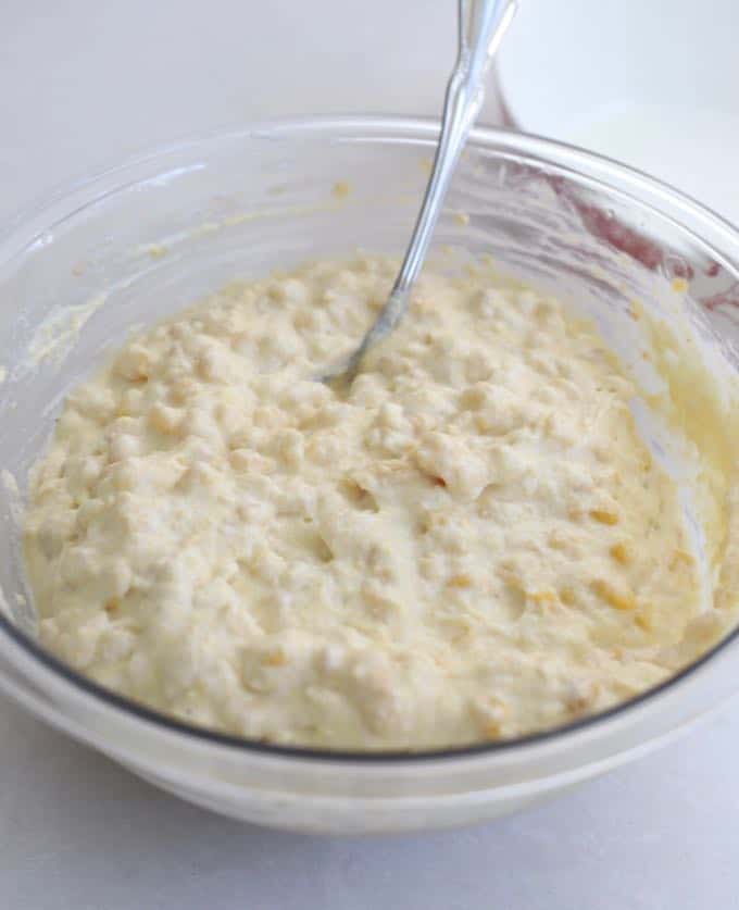 Mixing ingredients for Southern Cheesy Corn Pudding