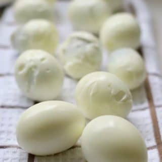 Hard boiled eggs on a dish towel
