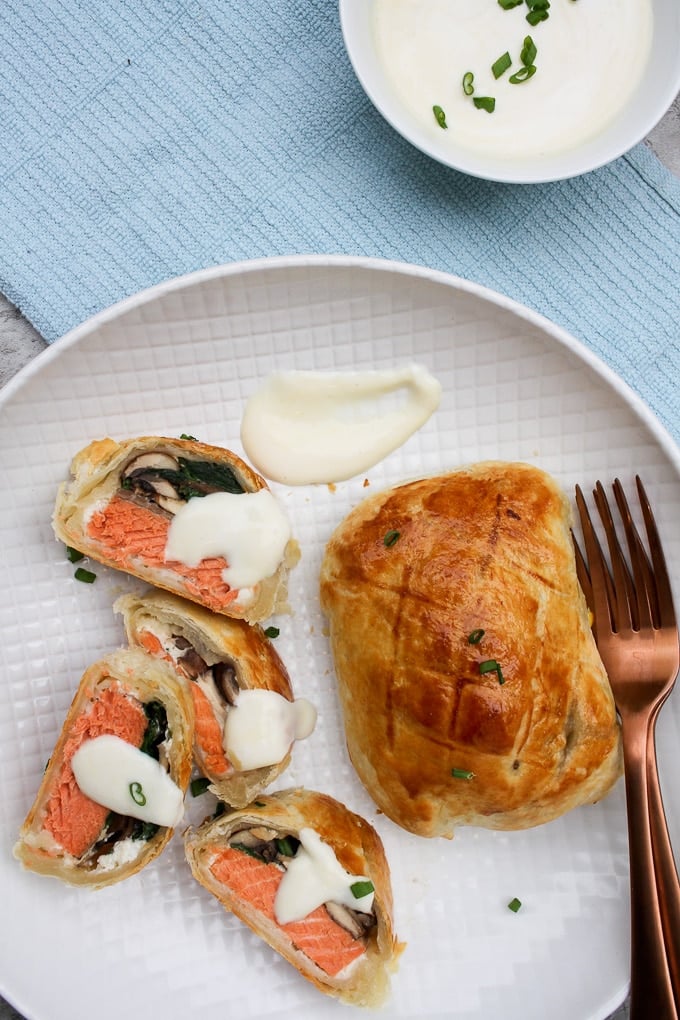 Salmon Wellington on a white plate.