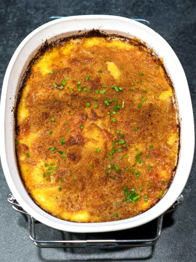 Easy Potatoes Au Gratin in a white baking dish.