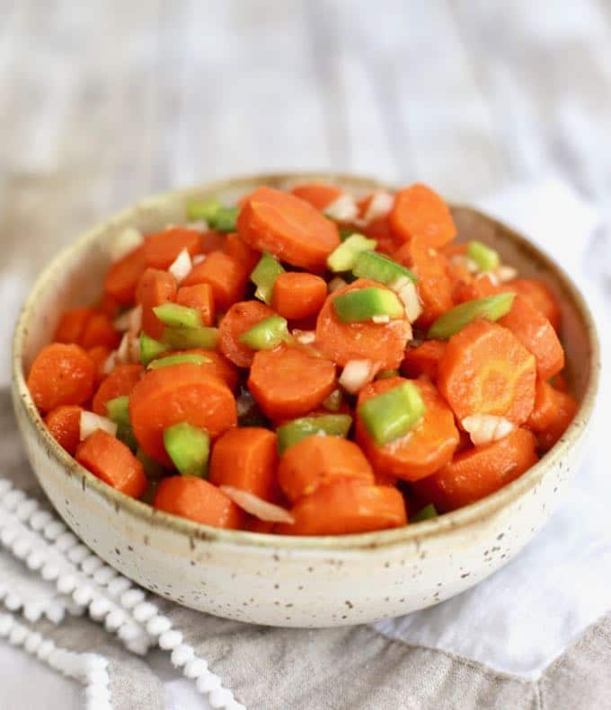 Copper pennies (marinated cooked carrots) in a bowl. 