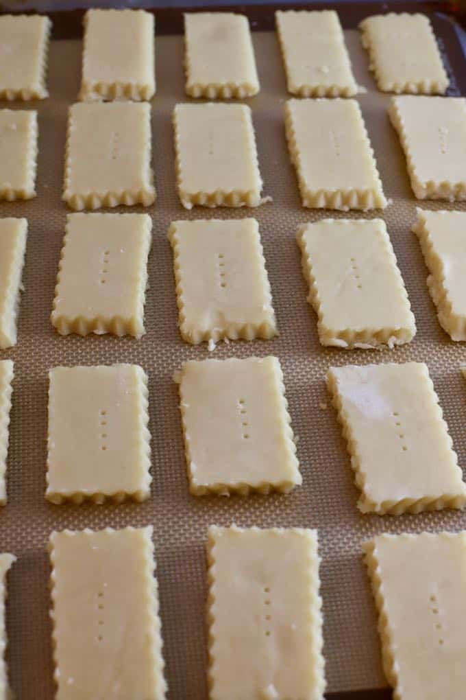 Lemon shortbread cookies on a baking sheet ready for the oven.