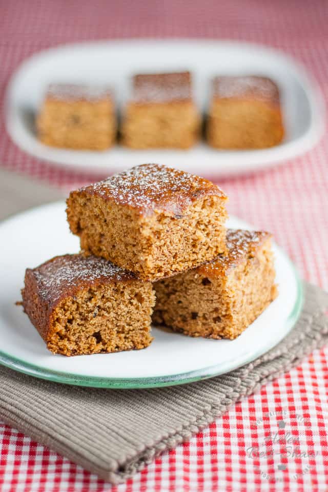 A white plate with three pieces of ginger cake.