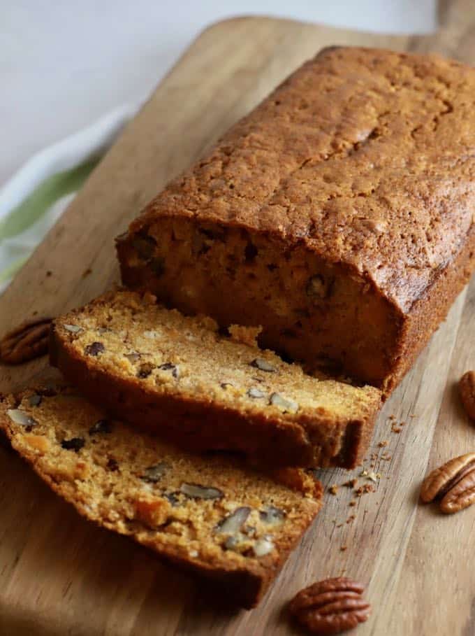 Sweet potato bread on a wooden cutting board.