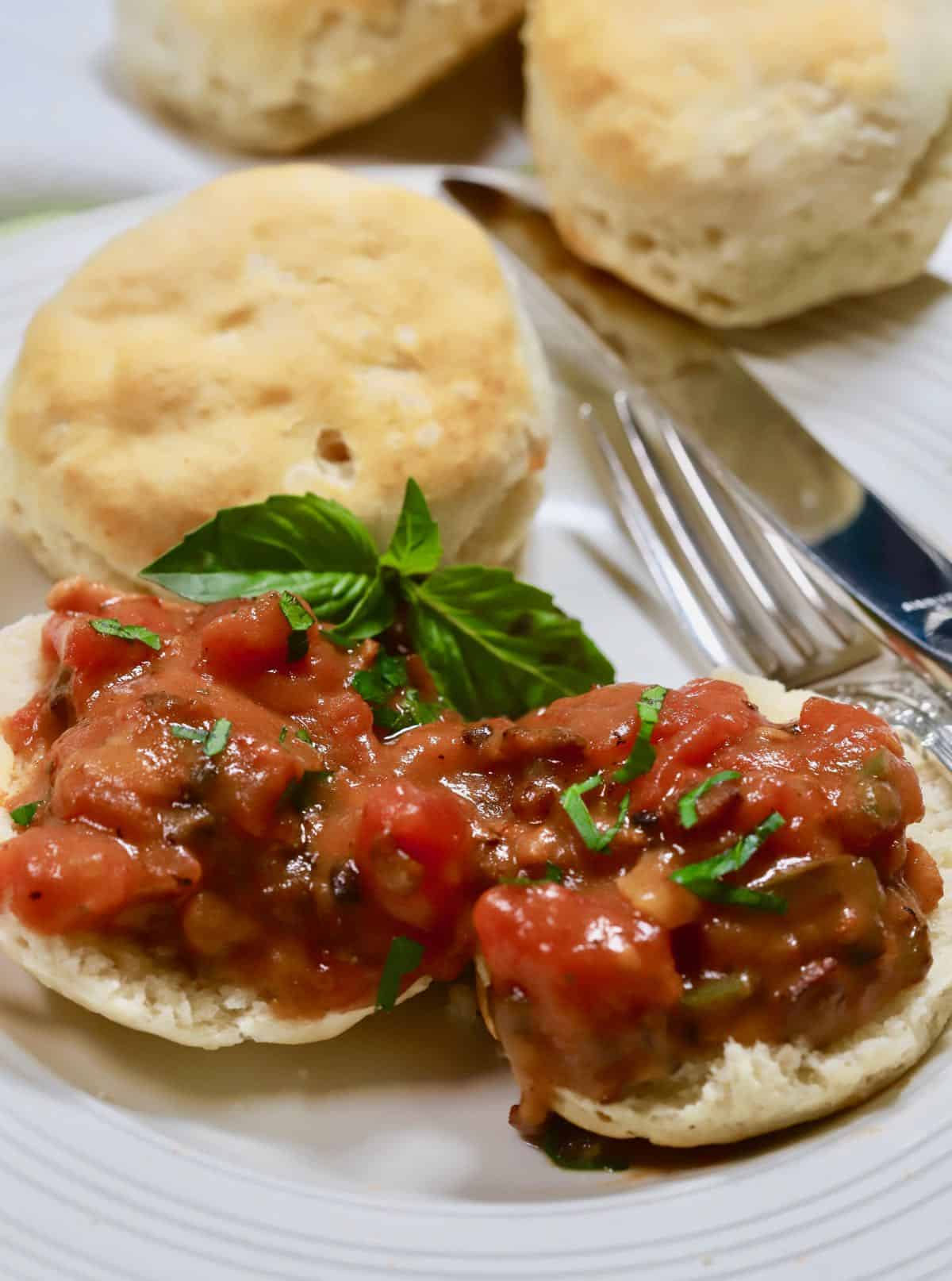 Tomato gravy over biscuit halves.