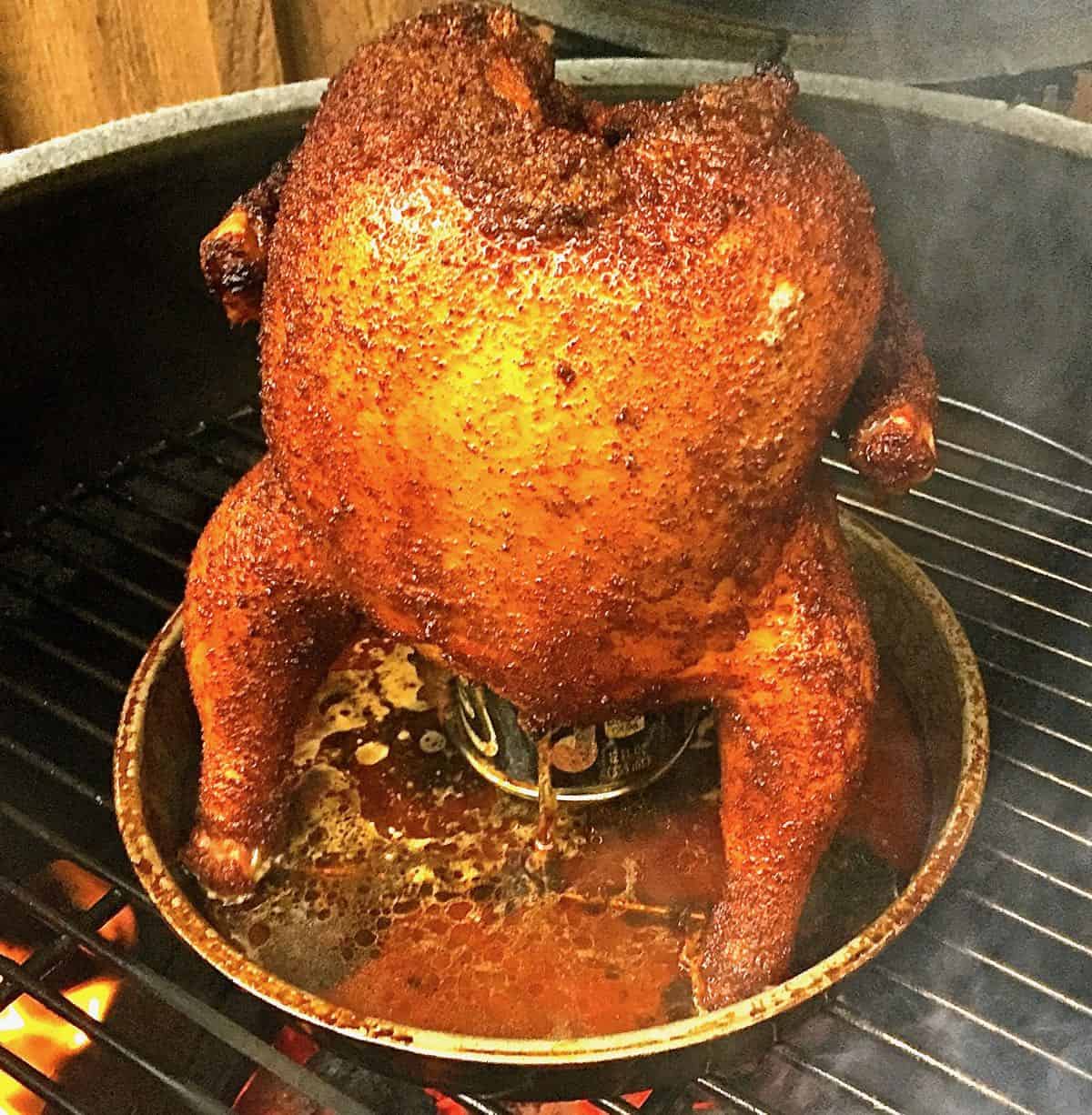 Beer can chicken being grilled on a Big Green Egg.