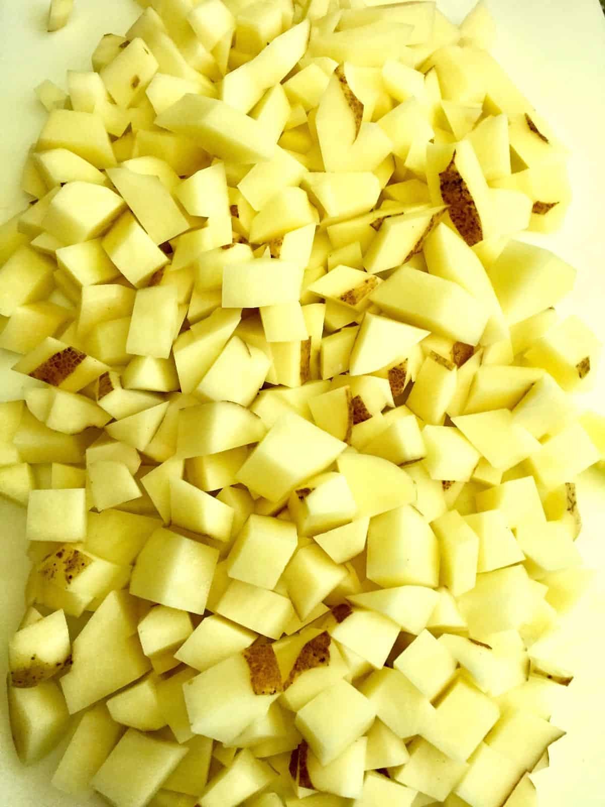 Potatoes peeled and cut into cubes.