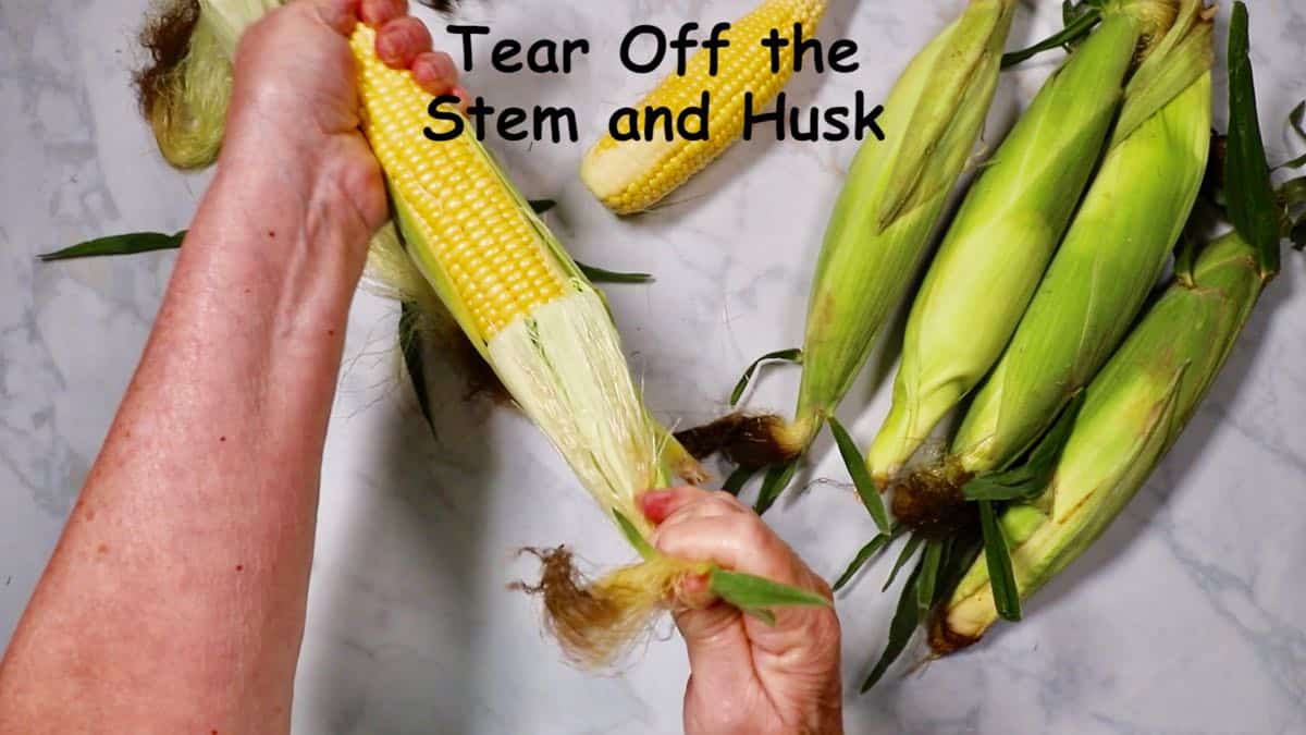 Shucking corn. 
