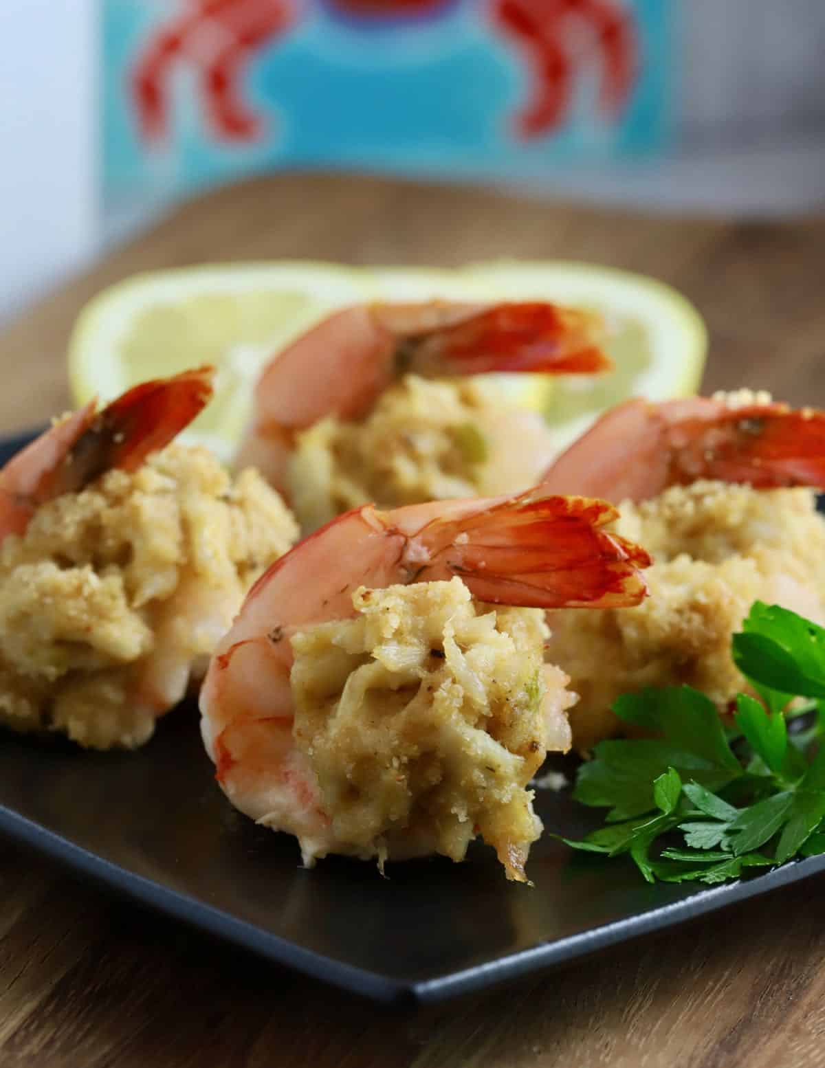 Four butterflied shrimp stuffed with crabmeat. 