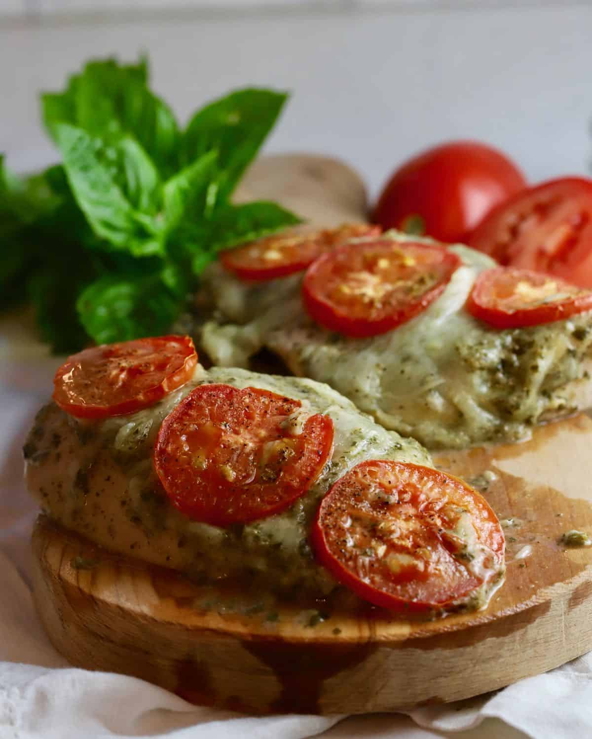 Baked Pesto Chicken Recipe | gritsandpinecones.com