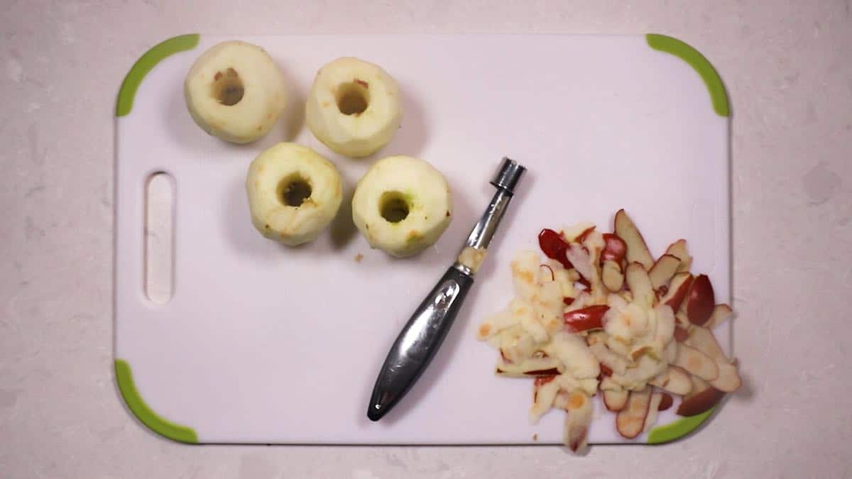 Four apples peeled and cored. 