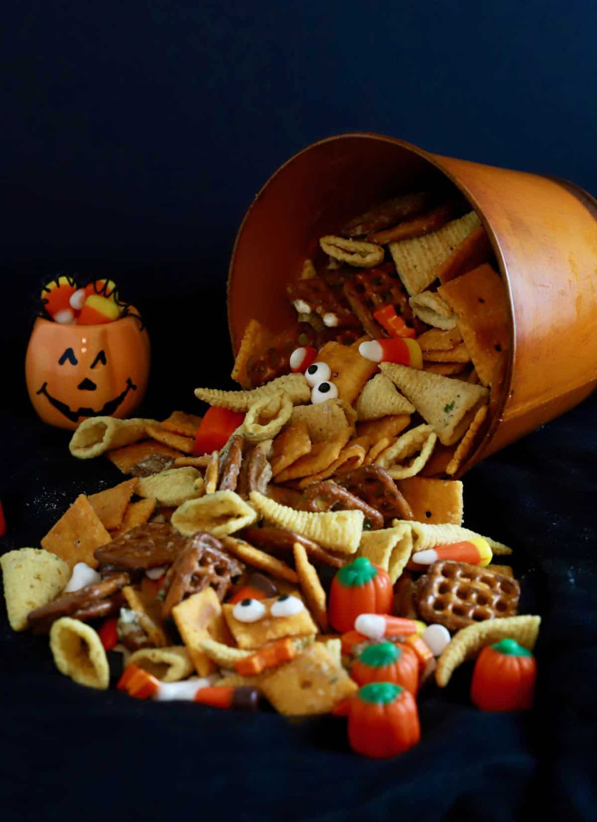 Halloween snack mix with Cheez-its, Bugles and pretzels.