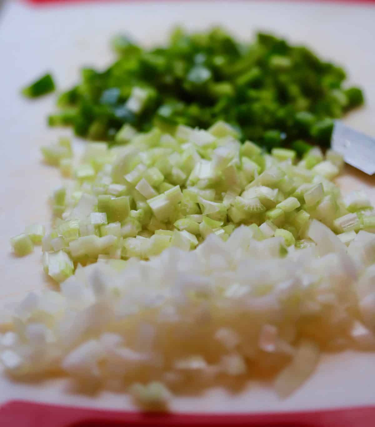 Chopped onion, celery, and bell pepper.