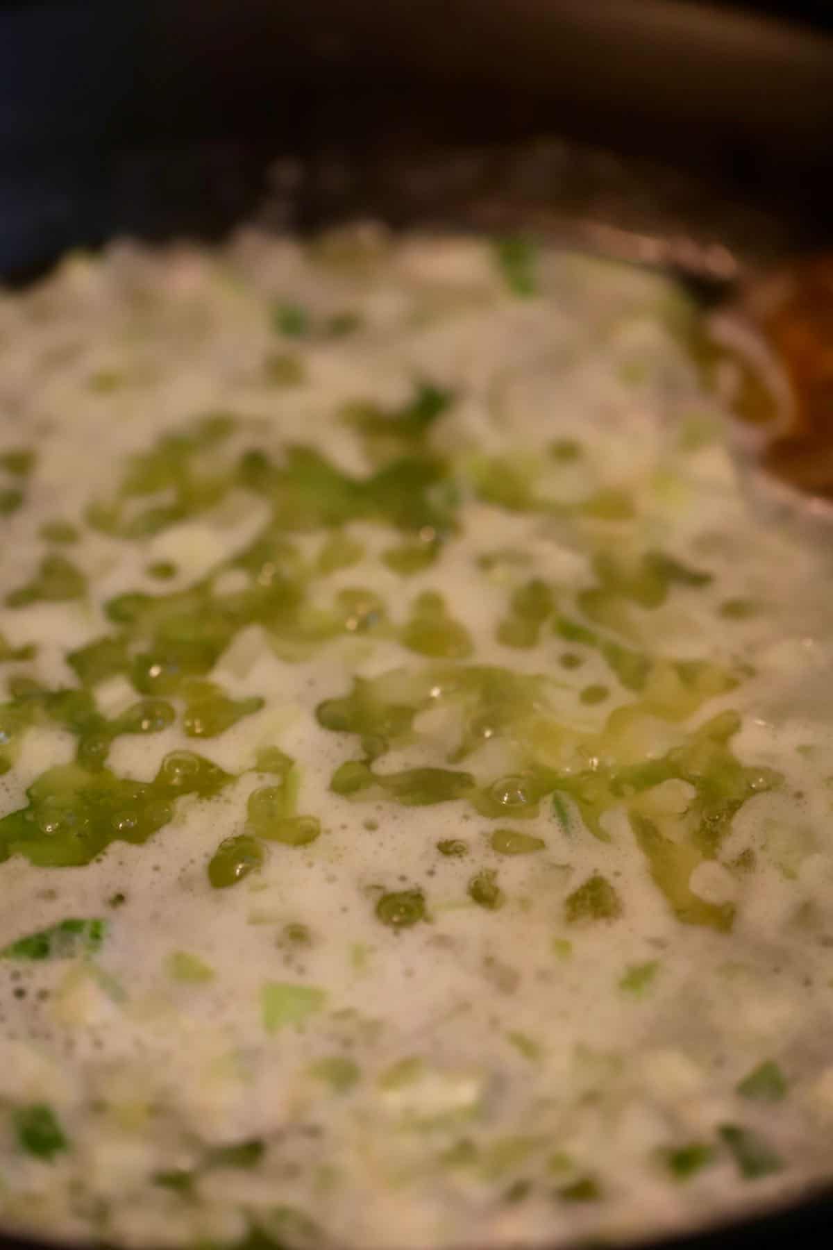 Chopped vegetables cooking in butter. 