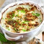 Baked Blue Cheese Au Gratin Potatoes in a white dish.